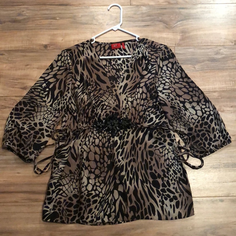 Tapemeasure brand animal print blouse size medium